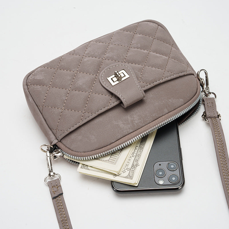 Lifestyle image of woman carrying the phone bag outdoors