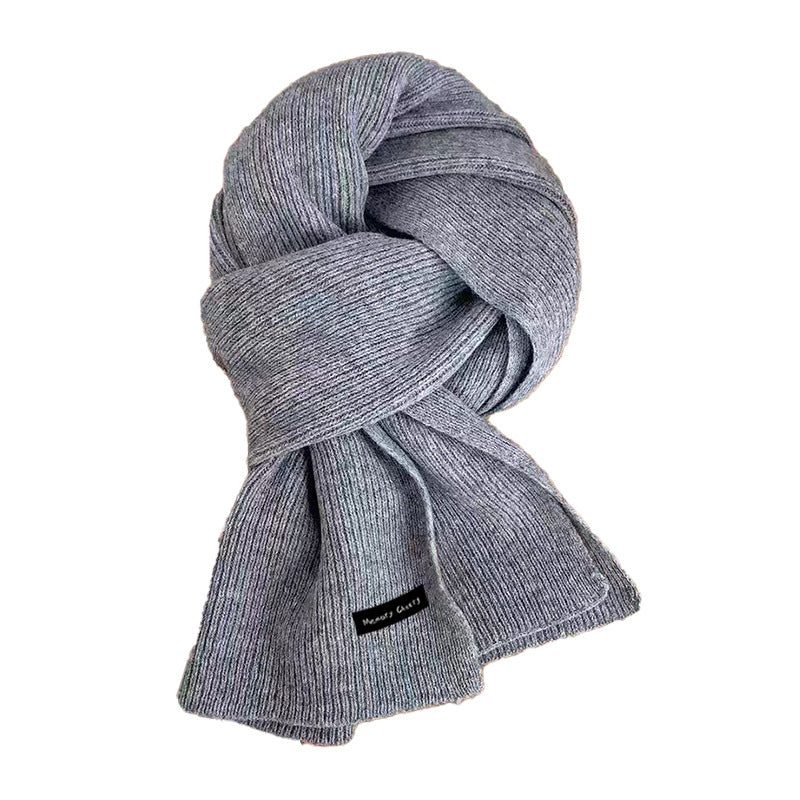 Fashionable blue knitted scarf for winter outfits
