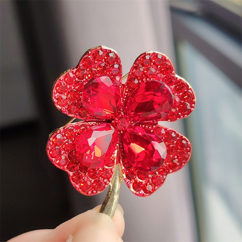 Close-up view of elegant clover brooch
