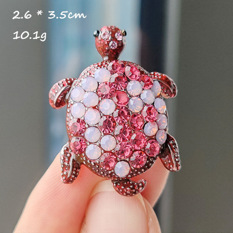 Charming turtle design brooch on display