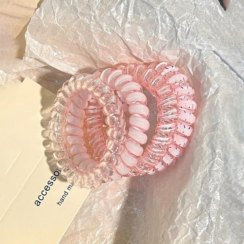 Set of 4 colourful hair ties packaging