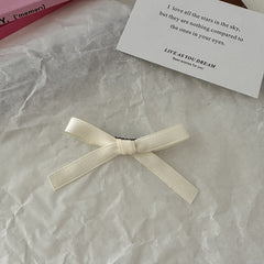 Cute pink bow hair clip for summer fashion