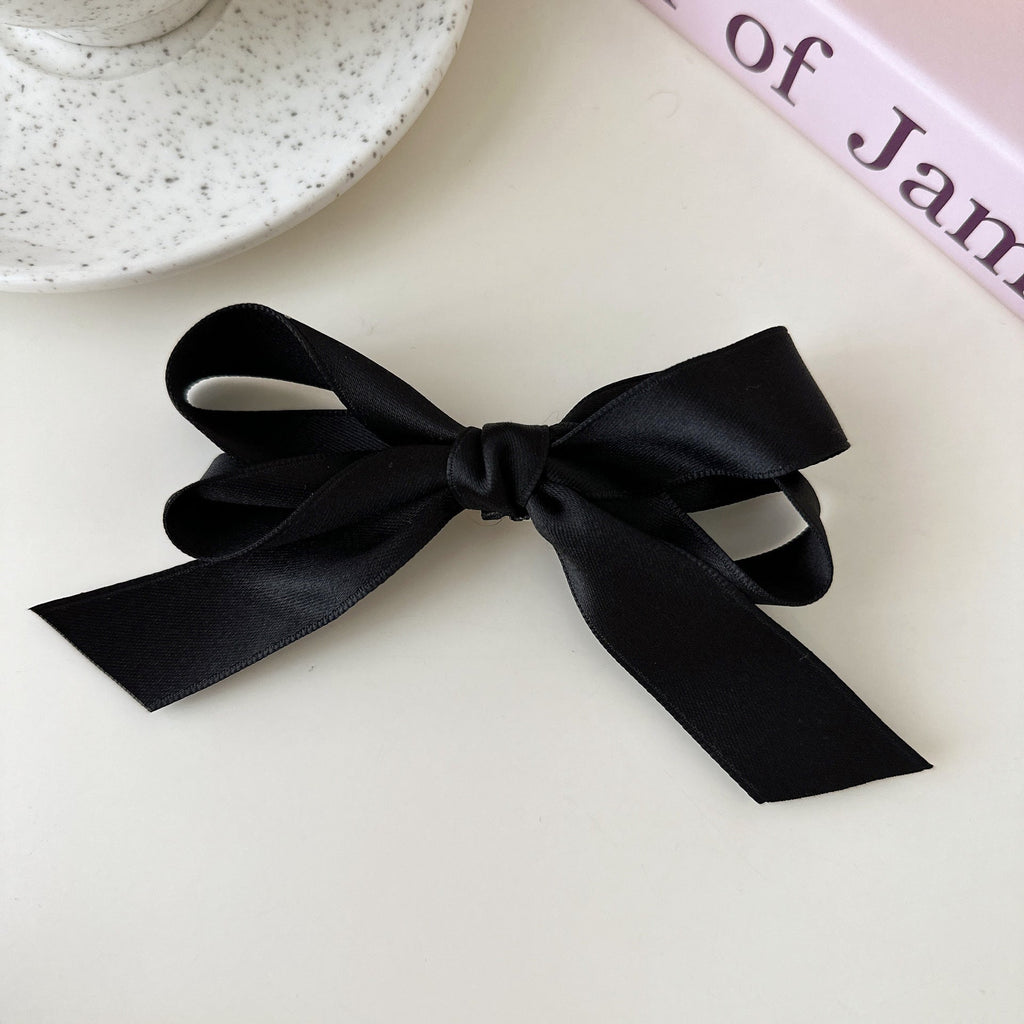 Fashionable red bow hair clip for any outfit