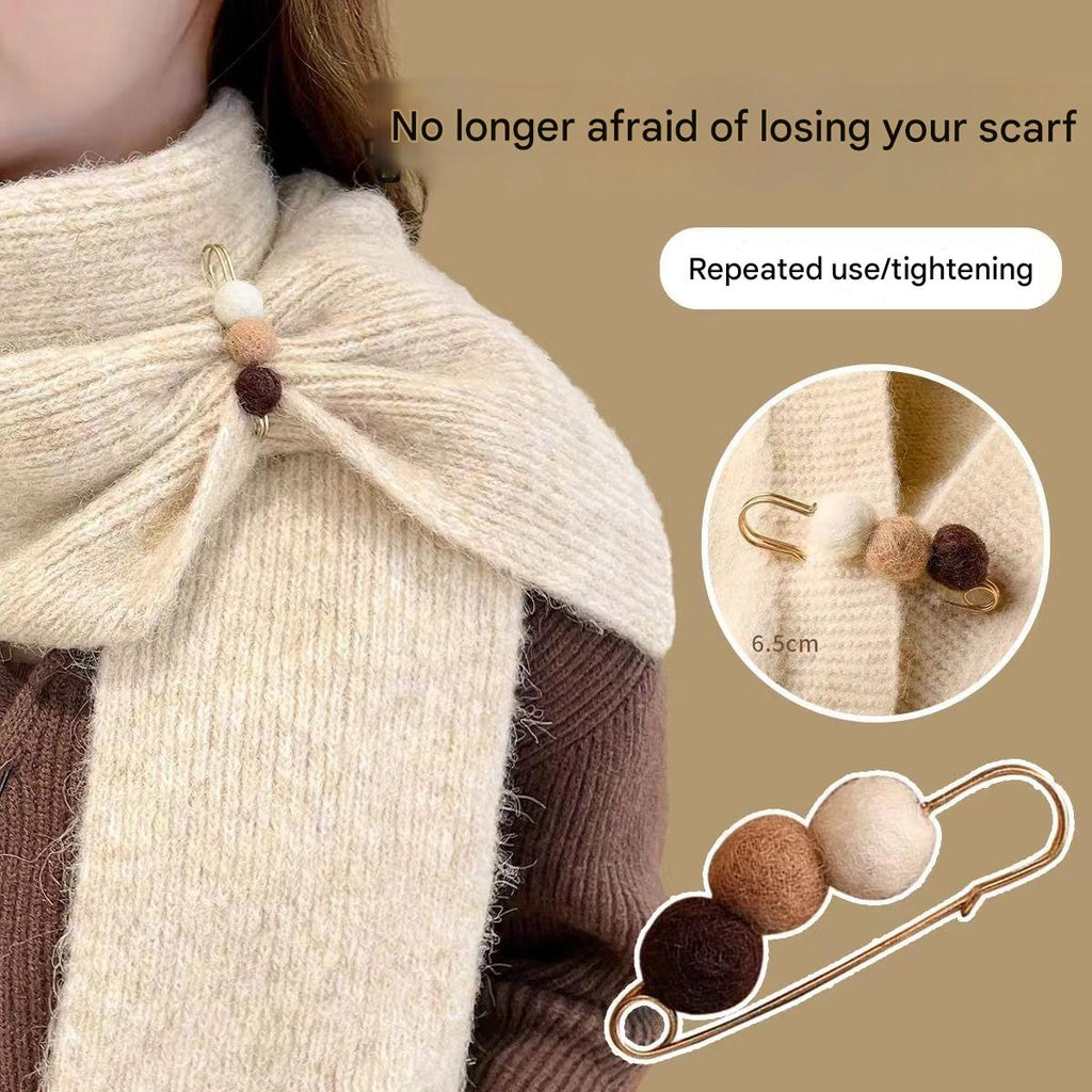 Elegant cardigan brooch on a casual outfit