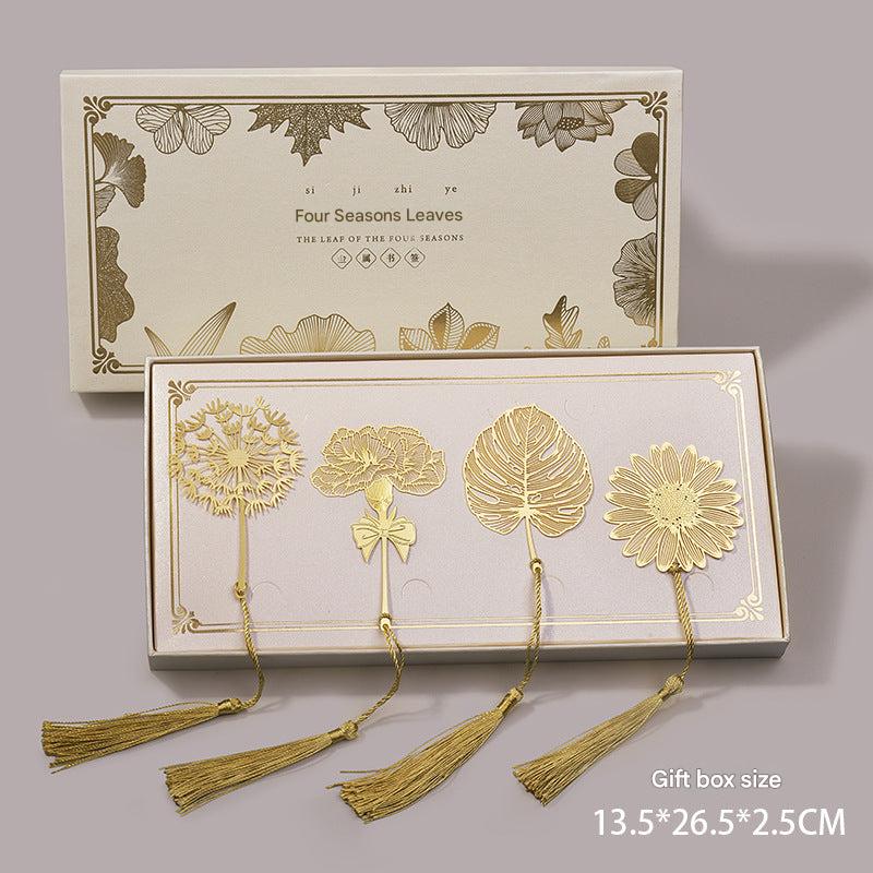 Elegant metal bookmark with intricate designs