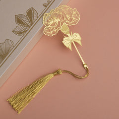 Elegant bookmark resting next to books
